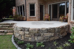 landscaping rock retaining wall and patio design and installation project